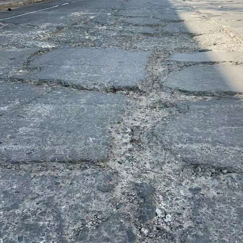 鸡东路面起砂露石子修补料